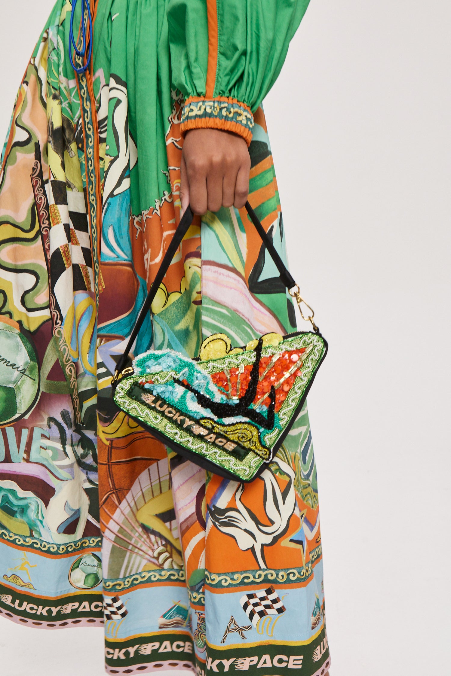 Lucky Pace Beaded Triangle Clutch bag Alèmais